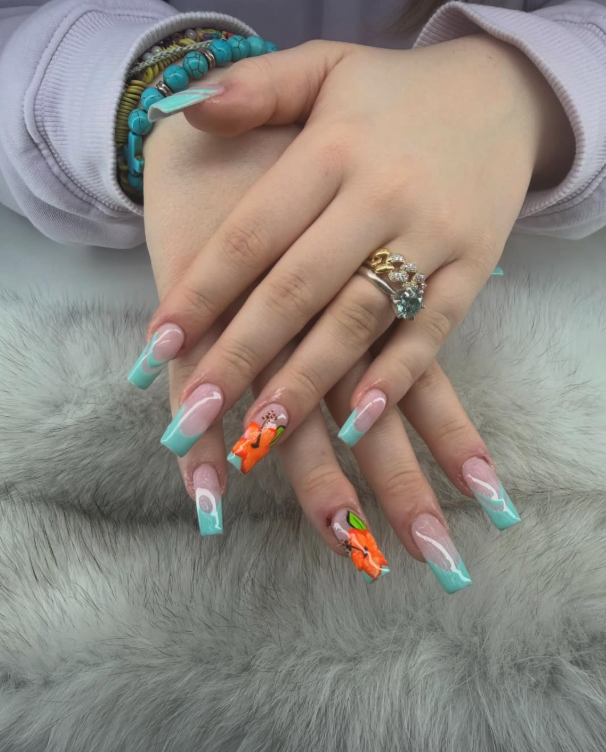 Nail art - teal French tip with floral design